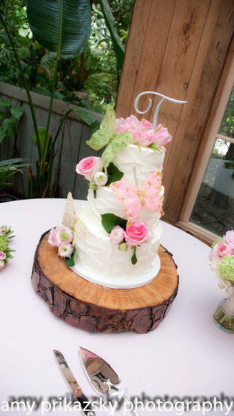 wedding cake, pink & green flowers & butterflies